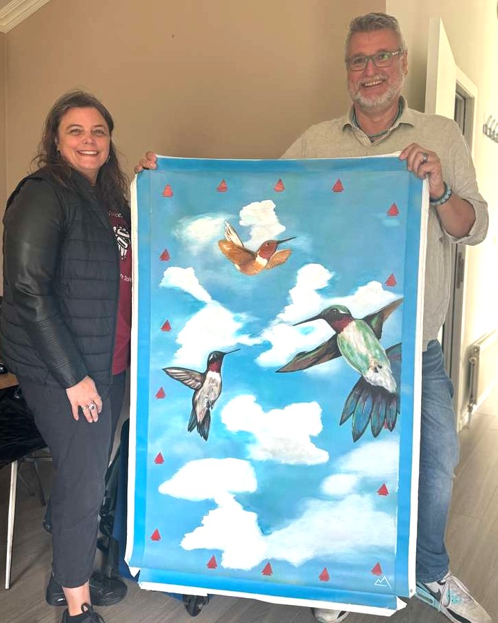 Suzanne en Henk met het schilderij
